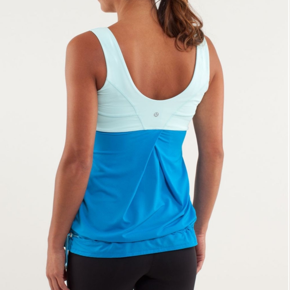 Lululemon Tame Me Tank size 4. Blue and aqua. Adorable and in great shape!